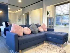 Beautiful 1-bed flat with a blue sofa bed located at the heart of Newcastle on 93a Grey Street.